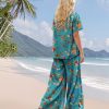 Women's Two Piece Outfits Summer Casual Floral Short Sleeve Slit Wide Leg Pants Set Vacation Airport Clothes CS1